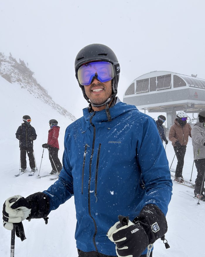 Ryan skiing on a snowy mountain